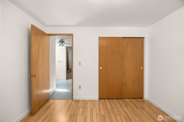 8833 47th Pl W, Mukilteo, WA 98275 - unfurnished bedroom featuring light wood-type flooring and a closet