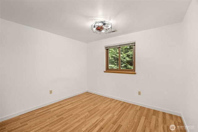 8833 47th Pl W, Mukilteo, WA 98275 - empty room with baseboards and light wood-style floors