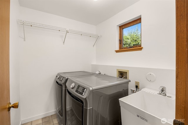 8833 47th Pl W, Mukilteo, WA 98275 - laundry room featuring washer and dryer and light tile patterned floors