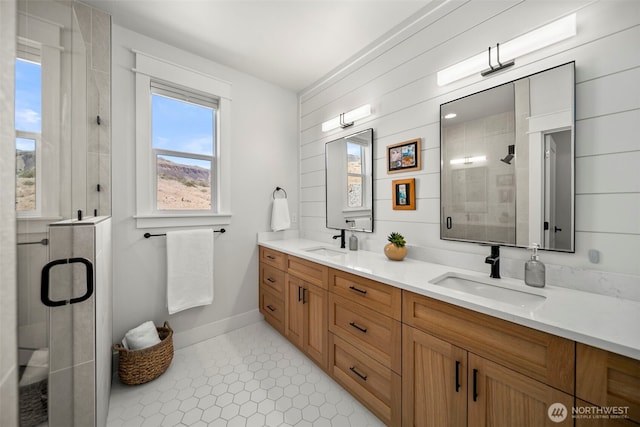 451S Partridge Ln, East Wenatchee, WA 98802 - bathroom with double vanity, a stall shower, and tile patterned flooring