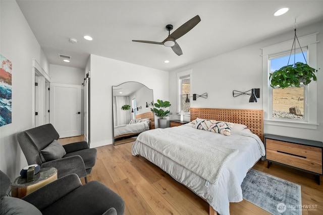 451S Partridge Ln, East Wenatchee, WA 98802 - bedroom featuring multiple windows, light wood-style floors, recessed lighting, and a ceiling fan