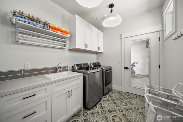451S Partridge Ln, East Wenatchee, WA 98802 - washroom featuring cabinet space and washer and clothes dryer