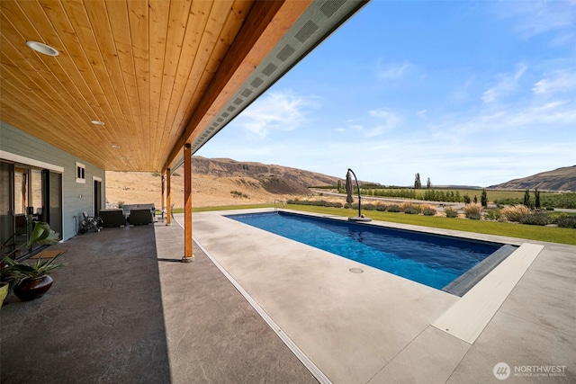 451S Partridge Ln, East Wenatchee, WA 98802 - swimming pool with a mountain view and a patio