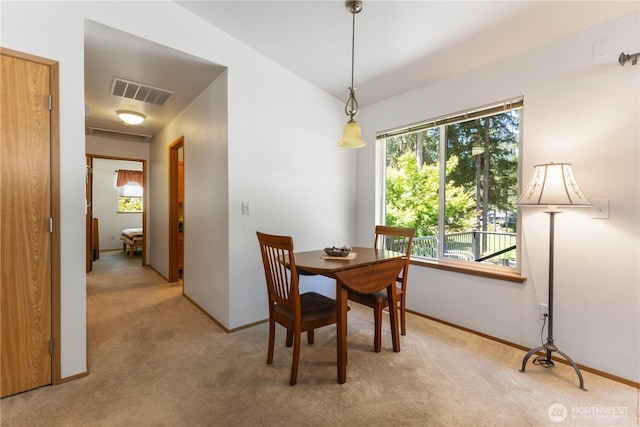 81 E Dunoon Pl, Shelton, WA 98584 - dining room with light colored carpet and healthy amount of natural light