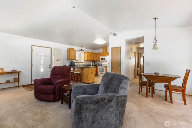 81 E Dunoon Pl, Shelton, WA 98584 - living area featuring vaulted ceiling and light carpet