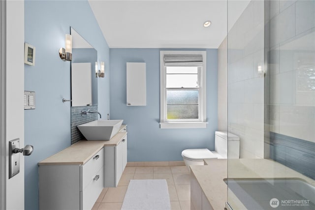 4315 52nd Ave NE, Seattle, WA 98105 - bathroom featuring vanity, tile patterned floors, backsplash, a tub, and a shower