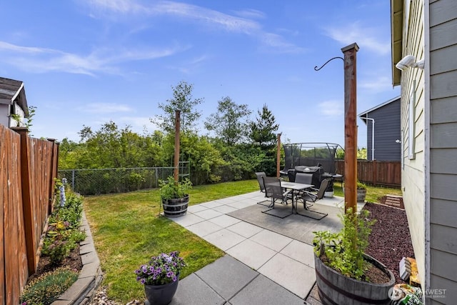 7308 Clamdigger Dr, Blaine, WA 98230 - fenced backyard with a patio area
