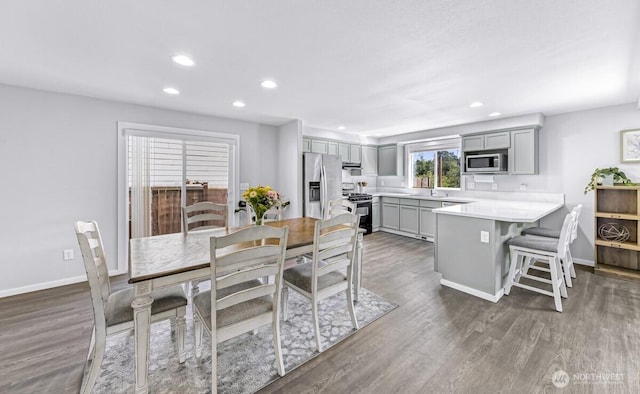 7308 Clamdigger Dr, Blaine, WA 98230 - dining area with dark wood finished floors and recessed lighting