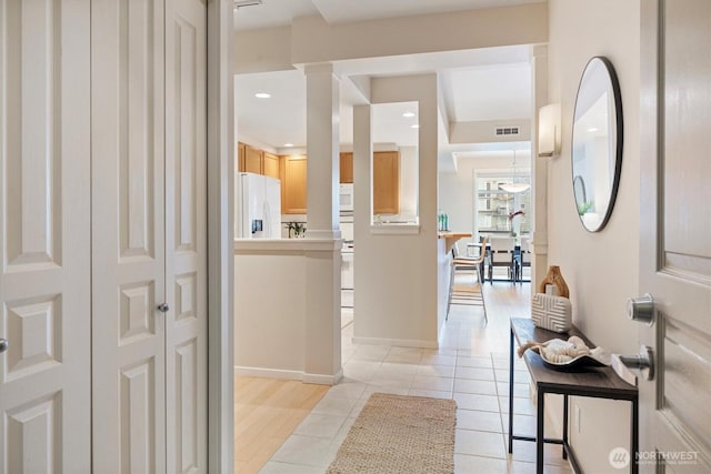 2801 1st Ave Unit 501, Seattle, WA 98121 - hallway with light tile patterned flooring and recessed lighting