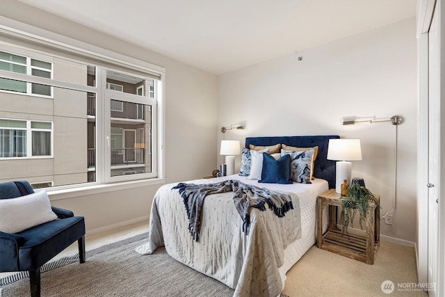 2801 1st Ave Unit 501, Seattle, WA 98121 - carpeted bedroom with baseboards