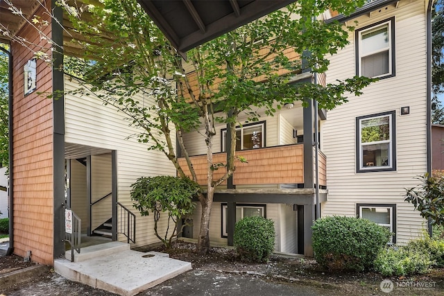 8615 238th St SW Unit B202, Edmonds, WA 98026 - rear view of property featuring a balcony