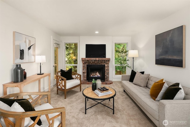 8615 238th St SW Unit B202, Edmonds, WA 98026 - living area featuring a fireplace, light colored carpet, and recessed lighting