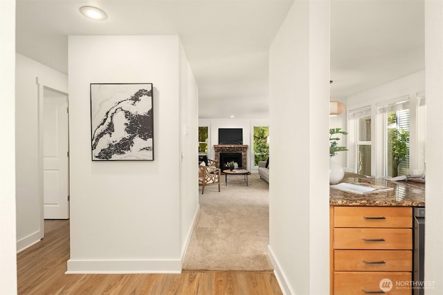 8615 238th St SW Unit B202, Edmonds, WA 98026 - hall featuring plenty of natural light and light wood finished floors