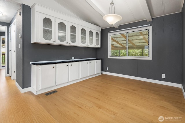 11500 Meridian Ave S Unit 22, Everett, WA 98208 - bar area featuring light wood finished floors and decorative light fixtures