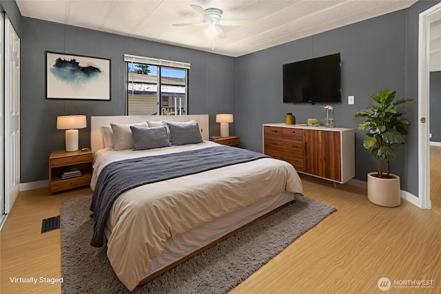 11500 Meridian Ave S Unit 22, Everett, WA 98208 - bedroom featuring light wood-style flooring and a ceiling fan