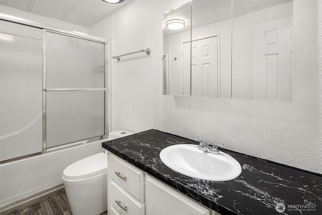 11500 Meridian Ave S Unit 22, Everett, WA 98208 - bathroom with vanity, shower / bath combination with glass door, and wood finished floors