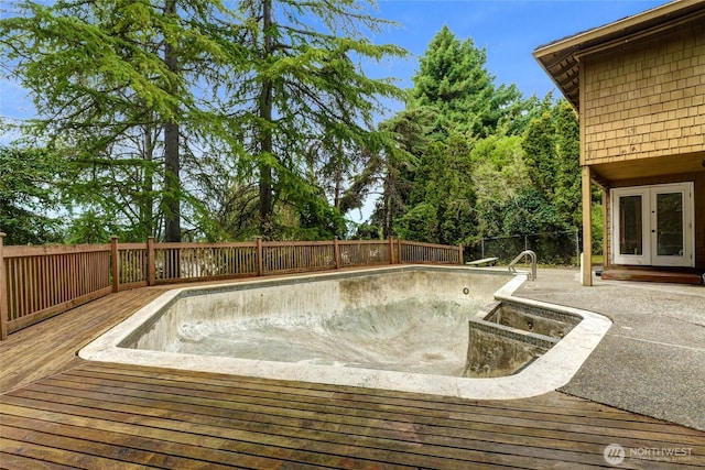 2305 88th St NE, Clyde Hill, WA 98004 - view of pool featuring french doors and a wooden deck