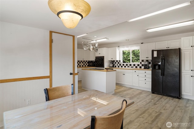 3613 Mcmullan Rd, Wenatchee, WA 98801 - unfurnished dining area featuring light wood finished floors and a sink