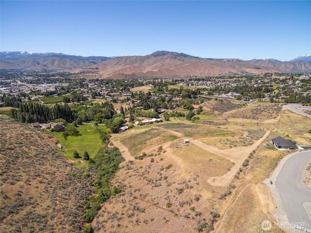 3613 Mcmullan Rd, Wenatchee, WA 98801 - drone / aerial view of a mountain backdrop