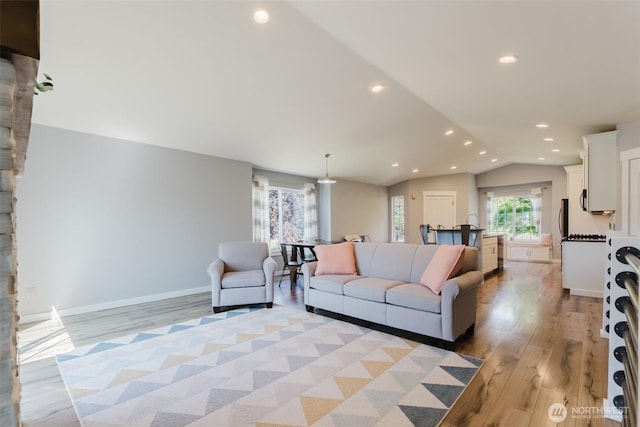 3761 Hannah Ct, Bellingham, WA 98226 - living area with light wood-type flooring, lofted ceiling, and recessed lighting
