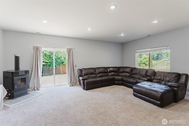 3761 Hannah Ct, Bellingham, WA 98226 - living room featuring carpet flooring, recessed lighting, and a wood stove