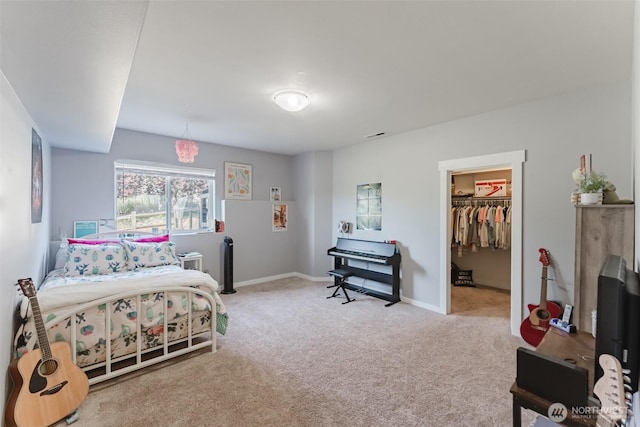 3761 Hannah Ct, Bellingham, WA 98226 - carpeted bedroom featuring a walk in closet and baseboards