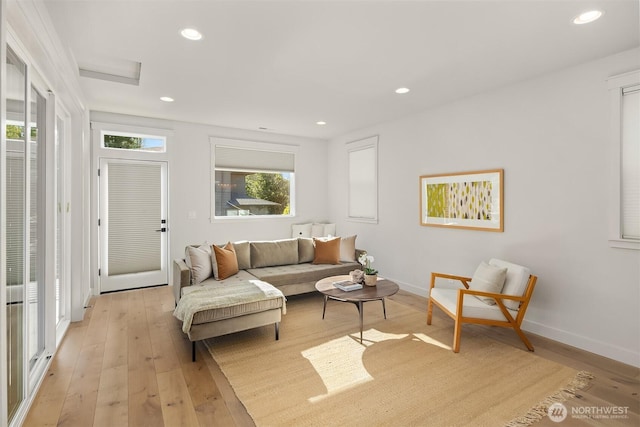 8841 Dibble Ave NW, Seattle, WA 98117 - living room with light wood-style flooring and recessed lighting