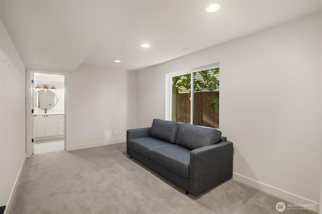8841 Dibble Ave NW, Seattle, WA 98117 - living area featuring light colored carpet and recessed lighting