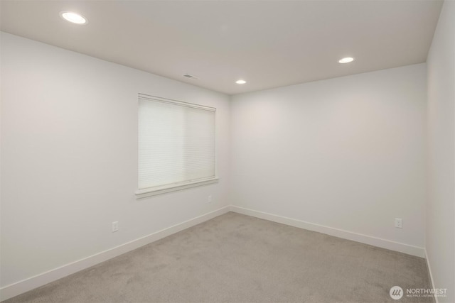 8841 Dibble Ave NW, Seattle, WA 98117 - empty room featuring light carpet and recessed lighting