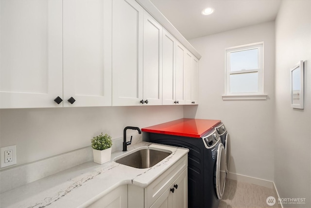 8841 Dibble Ave NW, Seattle, WA 98117 - laundry area with separate washer and dryer, cabinet space, recessed lighting, and carpet floors