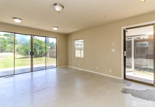 1632 Aberdeen Ave NE, Renton, WA 98056 - empty room featuring baseboards and concrete flooring