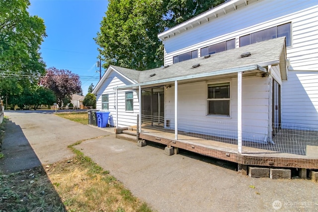 1632 Aberdeen Ave NE, Renton, WA 98056 - rear view of house with a shingled roof