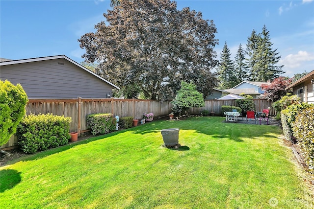 17004 137th Pl SE, Renton, WA 98058 - fenced backyard featuring a patio area