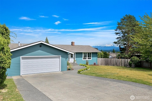 6002 Ridgeview Pl, Ferndale, WA 98248 - ranch-style house featuring concrete driveway, a mountain view, roof with shingles, and a chimney
