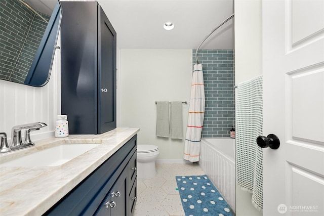 6002 Ridgeview Pl, Ferndale, WA 98248 - bathroom featuring vanity, speckled floor, and shower / bathtub combination with curtain