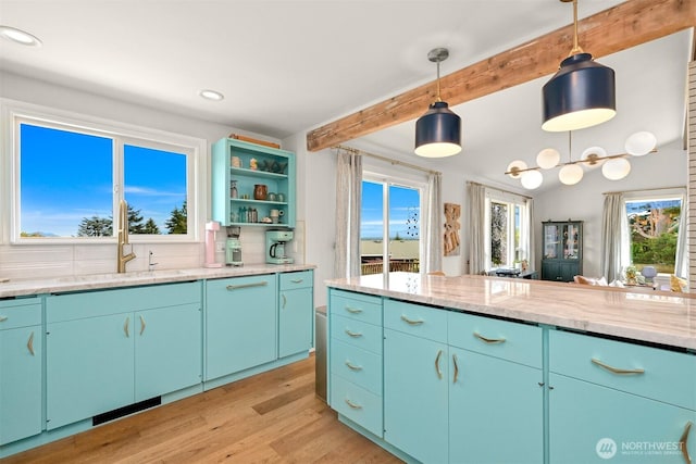 6002 Ridgeview Pl, Ferndale, WA 98248 - kitchen with light wood-style flooring, beam ceiling, recessed lighting, open shelves, and healthy amount of natural light