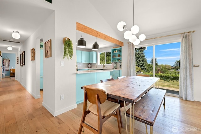 6002 Ridgeview Pl, Ferndale, WA 98248 - dining area featuring light wood-style floors and a chandelier
