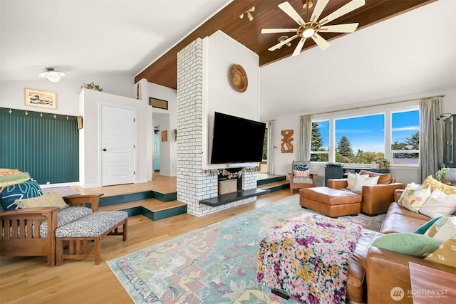 6002 Ridgeview Pl, Ferndale, WA 98248 - living area with ceiling fan, wood finished floors, beam ceiling, and high vaulted ceiling