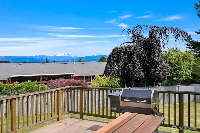 6002 Ridgeview Pl, Ferndale, WA 98248 - wooden terrace with a mountain view and grilling area