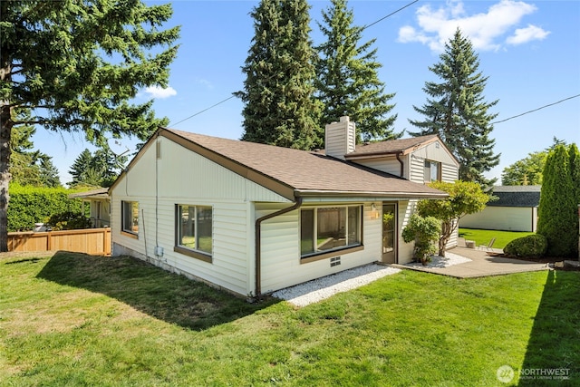 922 SW 160th St, Burien, WA 98166 - back of house with roof with shingles, a chimney, and a patio