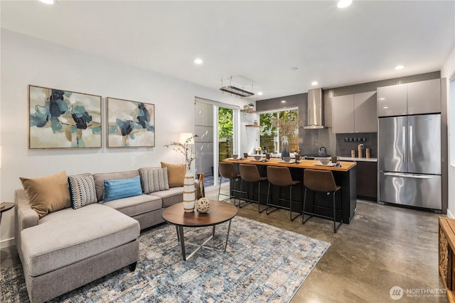 1804 25th Ave Unit A, Seattle, WA 98122 - living room with concrete flooring and recessed lighting