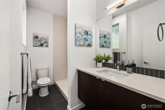 1804 25th Ave Unit A, Seattle, WA 98122 - full bathroom featuring vanity, tile patterned flooring, tasteful backsplash, and a tile shower