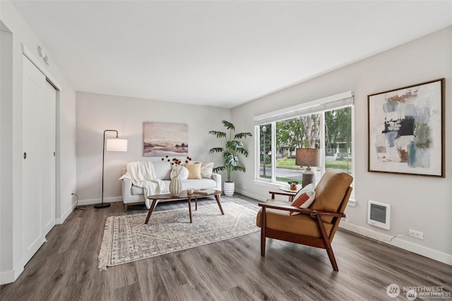 1022 N Anderson St, Tacoma, WA 98406 - living area with wood finished floors and heating unit