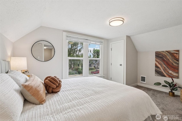 1022 N Anderson St, Tacoma, WA 98406 - carpeted bedroom featuring a textured ceiling and lofted ceiling
