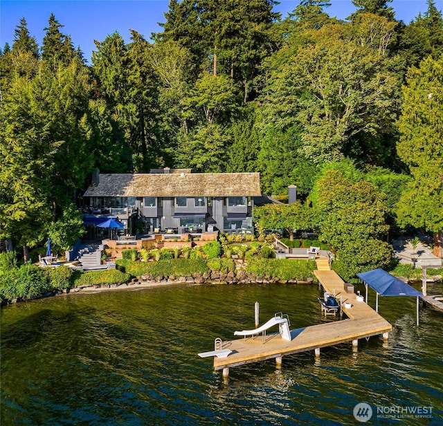 18 Holly Ln, Mercer Island, WA 98040 - dock featuring a water view and a wooded view