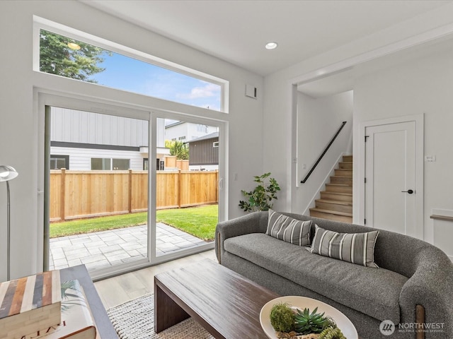 9015 Dibble Ave NW, Seattle, WA 98117 - living area featuring wood finished floors, stairs, and recessed lighting