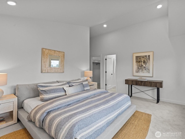 9015 Dibble Ave NW, Seattle, WA 98117 - carpeted bedroom with recessed lighting and vaulted ceiling