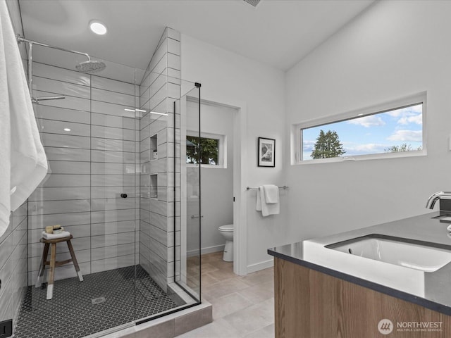 9015 Dibble Ave NW, Seattle, WA 98117 - full bath featuring vanity, a shower stall, and tile patterned flooring