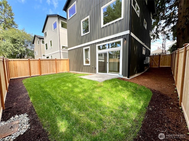 9015 Dibble Ave NW, Seattle, WA 98117 - rear view of property featuring a fenced backyard, board and batten siding, and cooling unit
