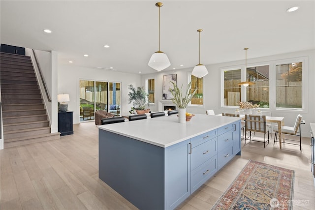 331 18th Ave, Kirkland, WA 98033 - kitchen featuring recessed lighting, light wood-style floors, decorative light fixtures, and open floor plan